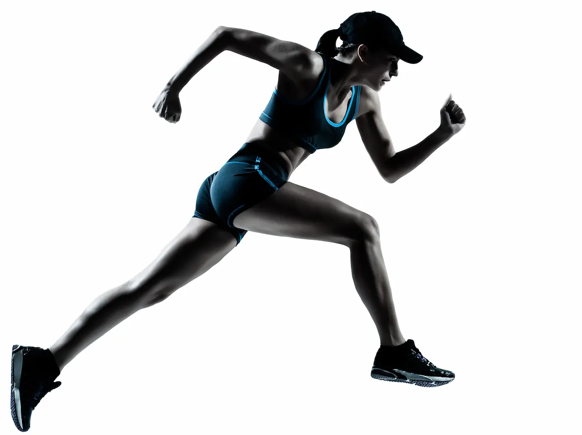 A strong, female athlete running